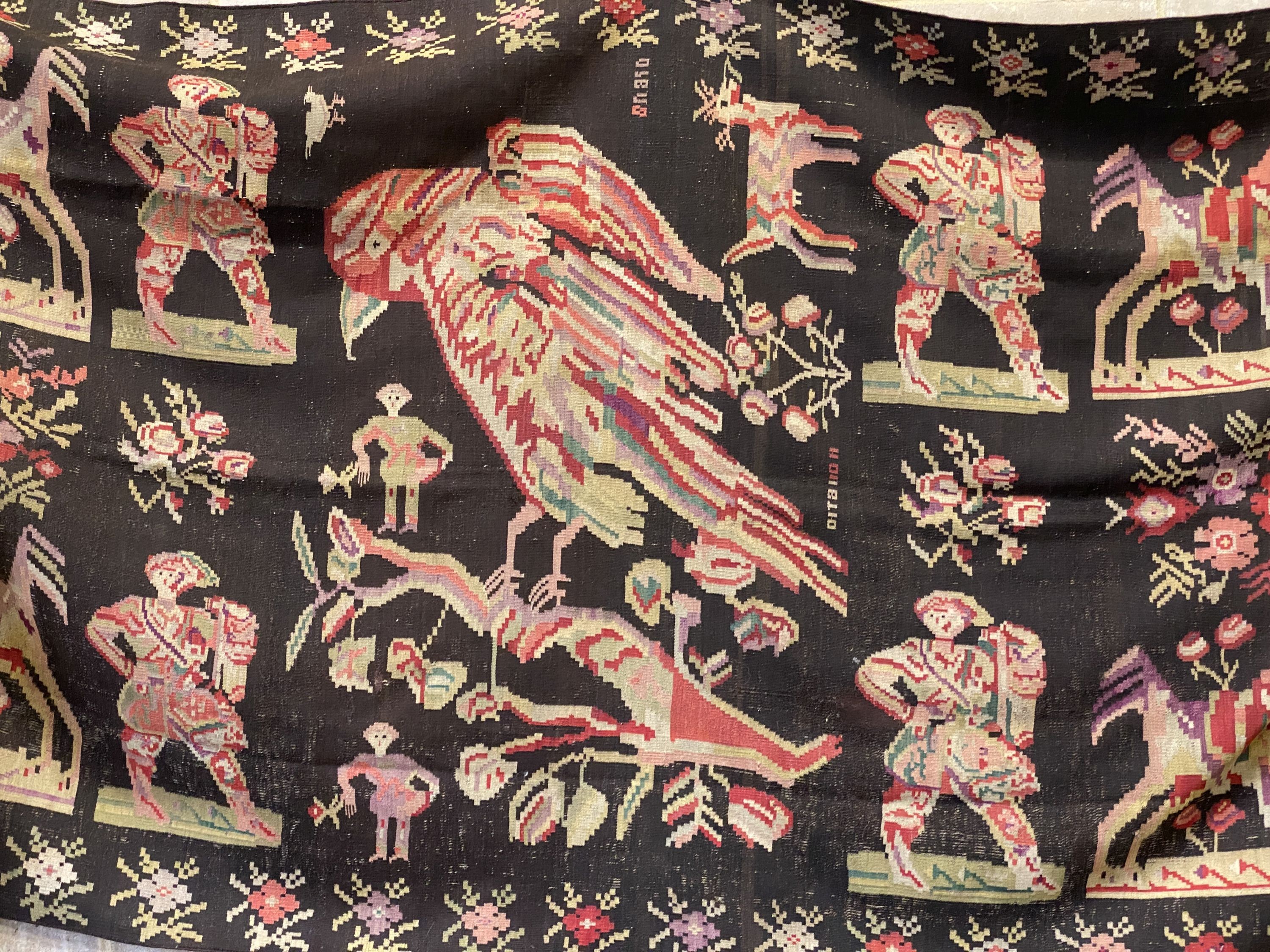 An antique Besbarabiam Kelim flatweave carpet woven with figures and birds, approx. 350 x 170cm